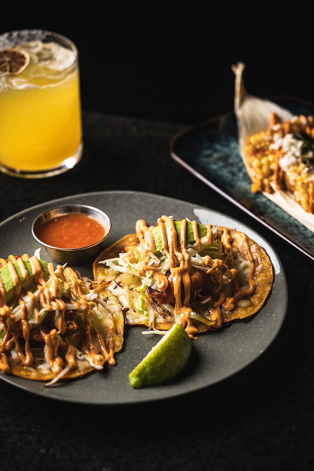 Bacanora shrimp tacos with lime and salsa