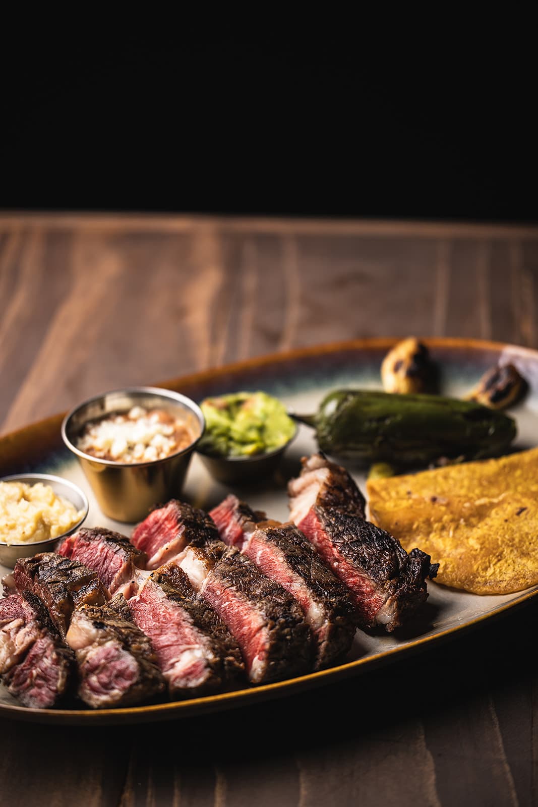 Ribeye de la Casa with guacamole and quesadillas
