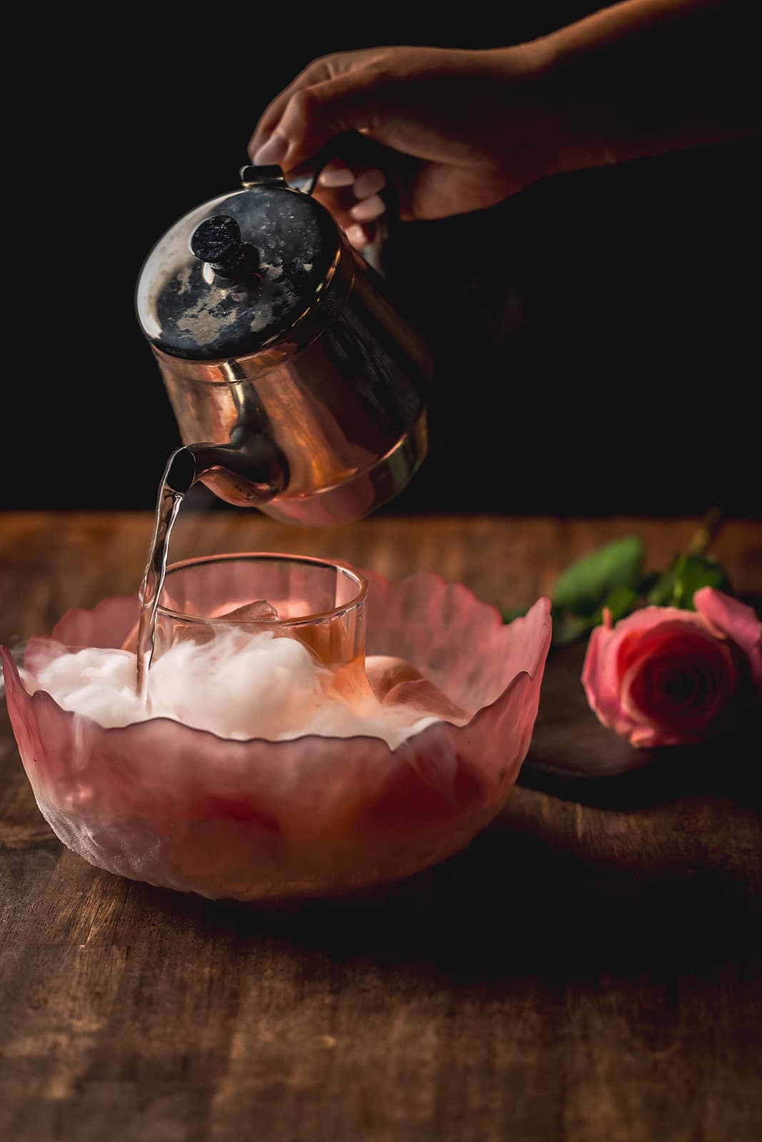 Silk Rose cocktail poured tableside over a dramatic cloud